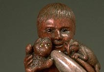 Friends: Purpleheart, Deer Antler: Four eye pairs inlaid: Amber & Gold Leaf, Horn, Black Plexiglas, Deer Antler